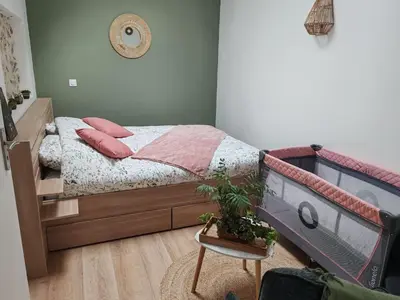 Un ou plusieurs lits dans un hébergement de l'établissement Chez Peggy