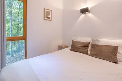 Un ou plusieurs lits dans un hébergement de l'établissement Les Charmes C23B - Le Val Joly