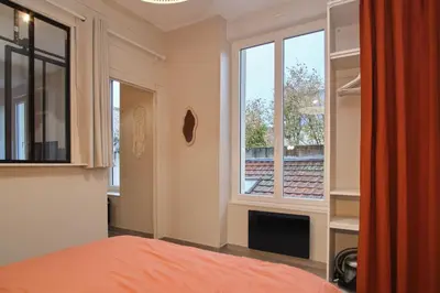 Un ou plusieurs lits dans un hébergement de l'établissement Superbe appartement proche cathédrale