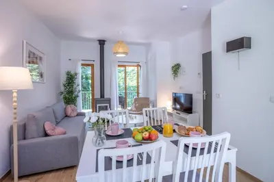 Télévision ou salle de divertissement dans l'établissement Les Charmes C38 - Le Val Joly
