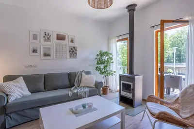 Coin salon dans l'établissement Le Sureau Noir S34 - Le Val Joly