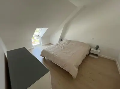 Un ou plusieurs lits dans un hébergement de l'établissement Appartement neuf proche gare