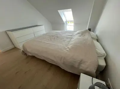 Un ou plusieurs lits dans un hébergement de l'établissement Appartement neuf proche gare