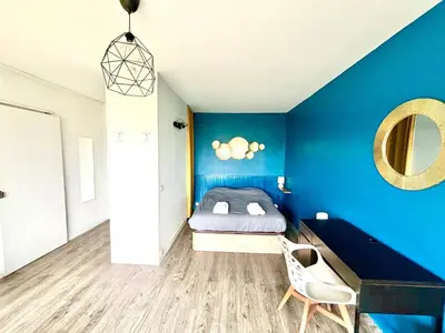 Un ou plusieurs lits dans un hébergement de l'établissement Studio Saint-Remi I Pommery