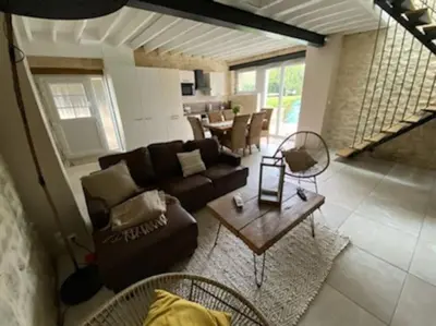 Coin salon dans l'établissement Maison chaleureuse avec piscine et aire de jeux
