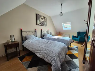 Un ou plusieurs lits dans un hébergement de l'établissement Clamecy Maison La Campagnarde