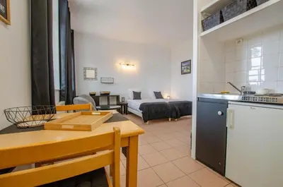 Cuisine ou kitchenette dans l'établissement Studio 1