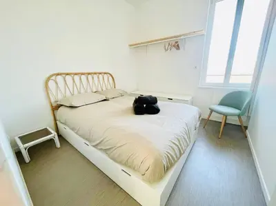 Un ou plusieurs lits dans un hébergement de l'établissement Appartement Lumineux & Confortable