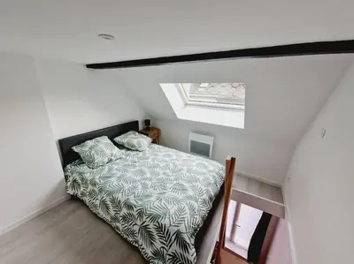 Un ou plusieurs lits dans un hébergement de l'établissement Appartements centre-ville Avesnes sur Helpe Duplex confort