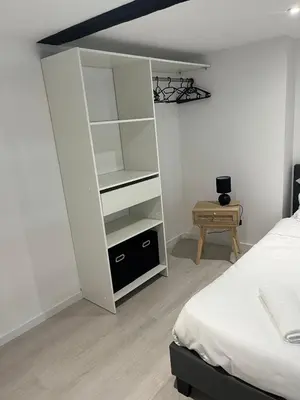 Un ou plusieurs lits dans un hébergement de l'établissement Appartements centre-ville Avesnes sur Helpe Duplex confort