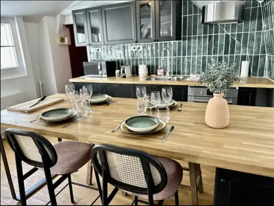 Cuisine ou kitchenette dans l'établissement Eucalyptus - Reims