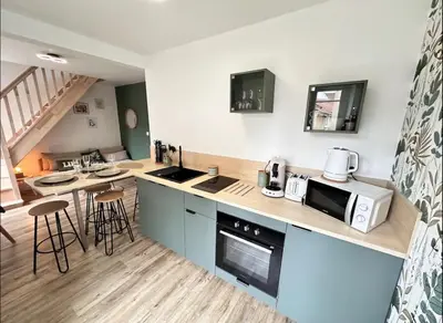 Cuisine ou kitchenette dans l'établissement Le Pinot