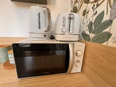 Cuisine ou kitchenette dans l'établissement Le Pinot