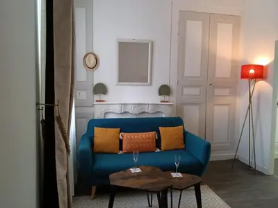 Coin salon dans l'établissement Appartement au cœur de la Petite Cité de Caractère