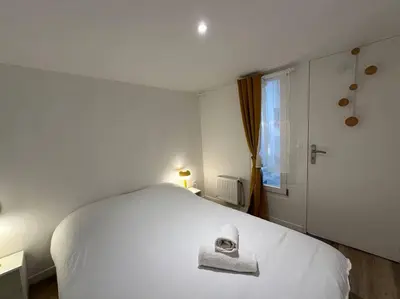 Un ou plusieurs lits dans un hébergement de l'établissement Libergier- Maisonnette cathédrale