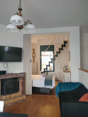 Télévision ou salle de divertissement dans l'établissement Maison chaleureuse près Disney