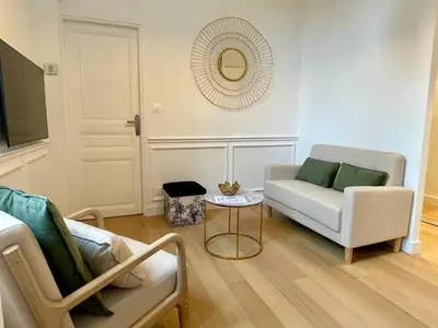 Coin salon dans l'établissement Appartements de charme du Général Leclerc - Place d'Erlon - Hypercentre - Gare - Reims
