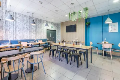 Restaurant ou autre lieu de restauration dans l'établissement Appart’City Confort Reims Centre