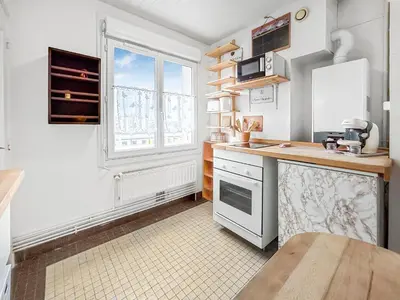 Cuisine ou kitchenette dans l'établissement Confort et vue à deux pas du centre