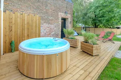 Jardin de l'établissement La Bergerie des 2 Tilleuls - Maison avec jacuzzi