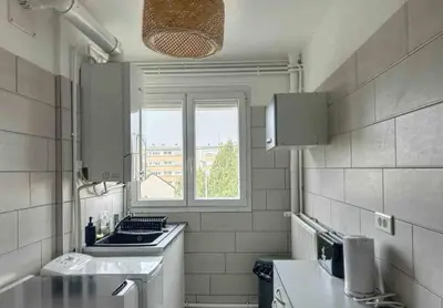 Cuisine ou kitchenette dans l'établissement Le Joseph - 5 minutes du centre ville