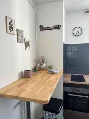 Cuisine ou kitchenette dans l'établissement Le Nid Douillet