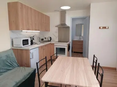 Cuisine ou kitchenette dans l'établissement Le merle enchanté