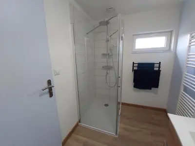 Salle de bains dans l'établissement Le merle enchanté