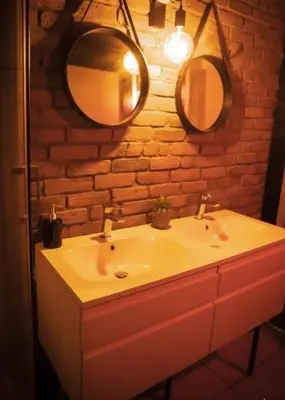 Salle de bains dans l'établissement L'Apothéose