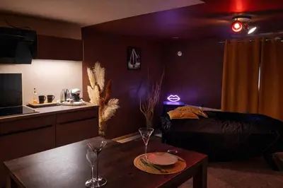 Cuisine ou kitchenette dans l'établissement L'Apothéose