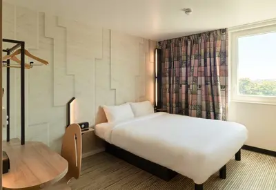 Un ou plusieurs lits dans un hébergement de l'établissement B&B HOTEL Meaux Nanteuil-lès-Meaux 3 étoiles