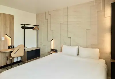 Un ou plusieurs lits dans un hébergement de l'établissement B&B HOTEL Meaux Nanteuil-lès-Meaux 3 étoiles