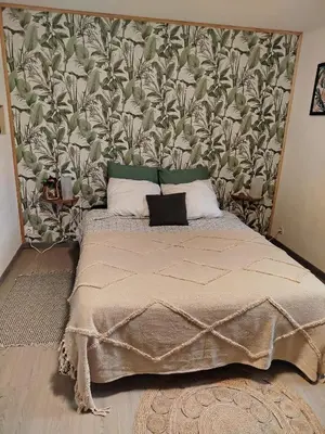 Un ou plusieurs lits dans un hébergement de l'établissement Chambre à la Campagne