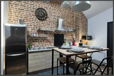 Cuisine ou kitchenette dans l'établissement Le 201 Bis