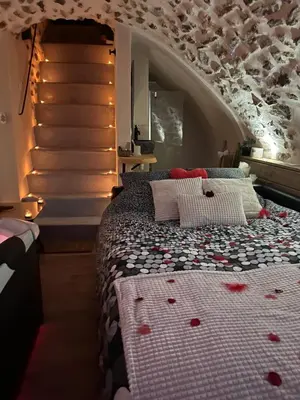 Un ou plusieurs lits dans un hébergement de l'établissement La Voûte Étoilée - Jacuzzi proche Disneyland Paris