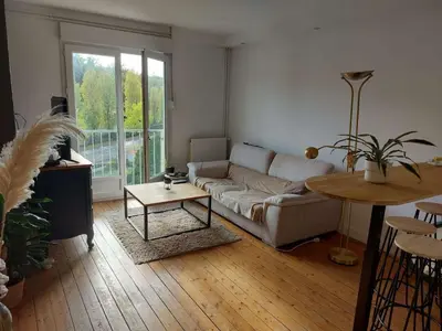 Coin salon dans l'établissement T4 Compiegne