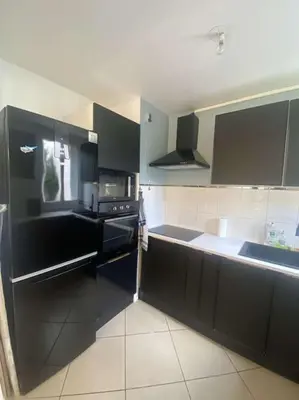 Cuisine ou kitchenette dans l'établissement T2 Compiegne