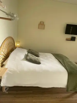 Un ou plusieurs lits dans un hébergement de l'établissement Hypnos-Hébergement champenois-Hypercentre