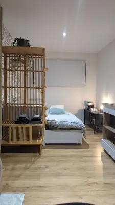 Un ou plusieurs lits dans un hébergement de l'établissement Jupiter Tiny House