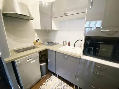 Cuisine ou kitchenette dans l'établissement Le Cathédrale - Hypercentre - Wifi