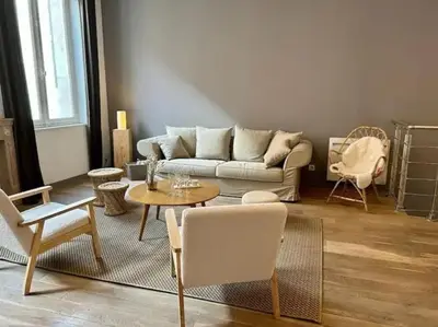 Coin salon dans l'établissement Chic 4 personnes Hypercentre 5 Minutes Avenue De Champagne