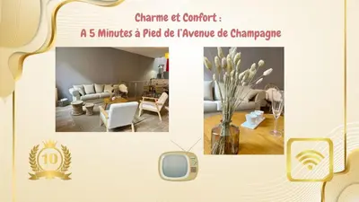 Coin salon dans l'établissement Chic 4 personnes Hypercentre 5 Minutes Avenue De Champagne