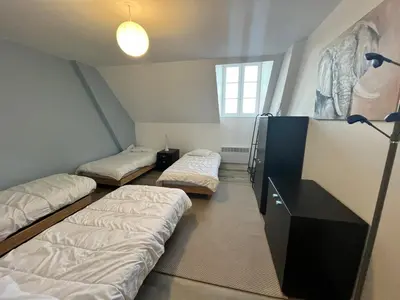 Un ou plusieurs lits dans un hébergement de l'établissement Le Gîte des Ecuries SPA, Domaine de Foreste
