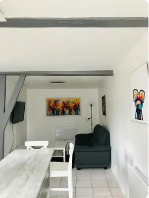 Coin salon dans l'établissement Charmante petite maison à la campagne
