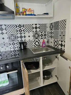 Cuisine ou kitchenette dans l'établissement Charmant F2 entièrement rénové