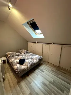 Un ou plusieurs lits dans un hébergement de l'établissement Belle maison à la campagne