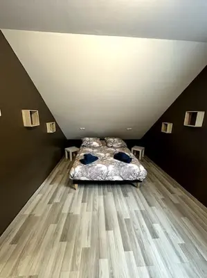 Un ou plusieurs lits dans un hébergement de l'établissement Belle maison à la campagne