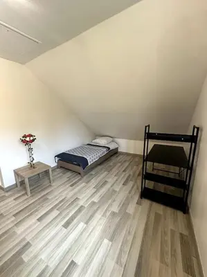 Un ou plusieurs lits dans un hébergement de l'établissement Belle maison à la campagne