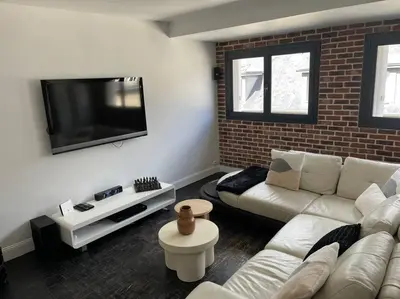 Télévision ou salle de divertissement dans l'établissement Le petit Refuge - hyper centre Compiegne