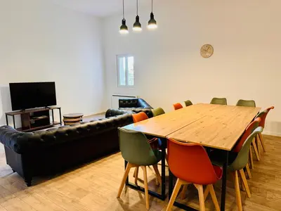 Télévision ou salle de divertissement dans l'établissement Appartement Jéroboam